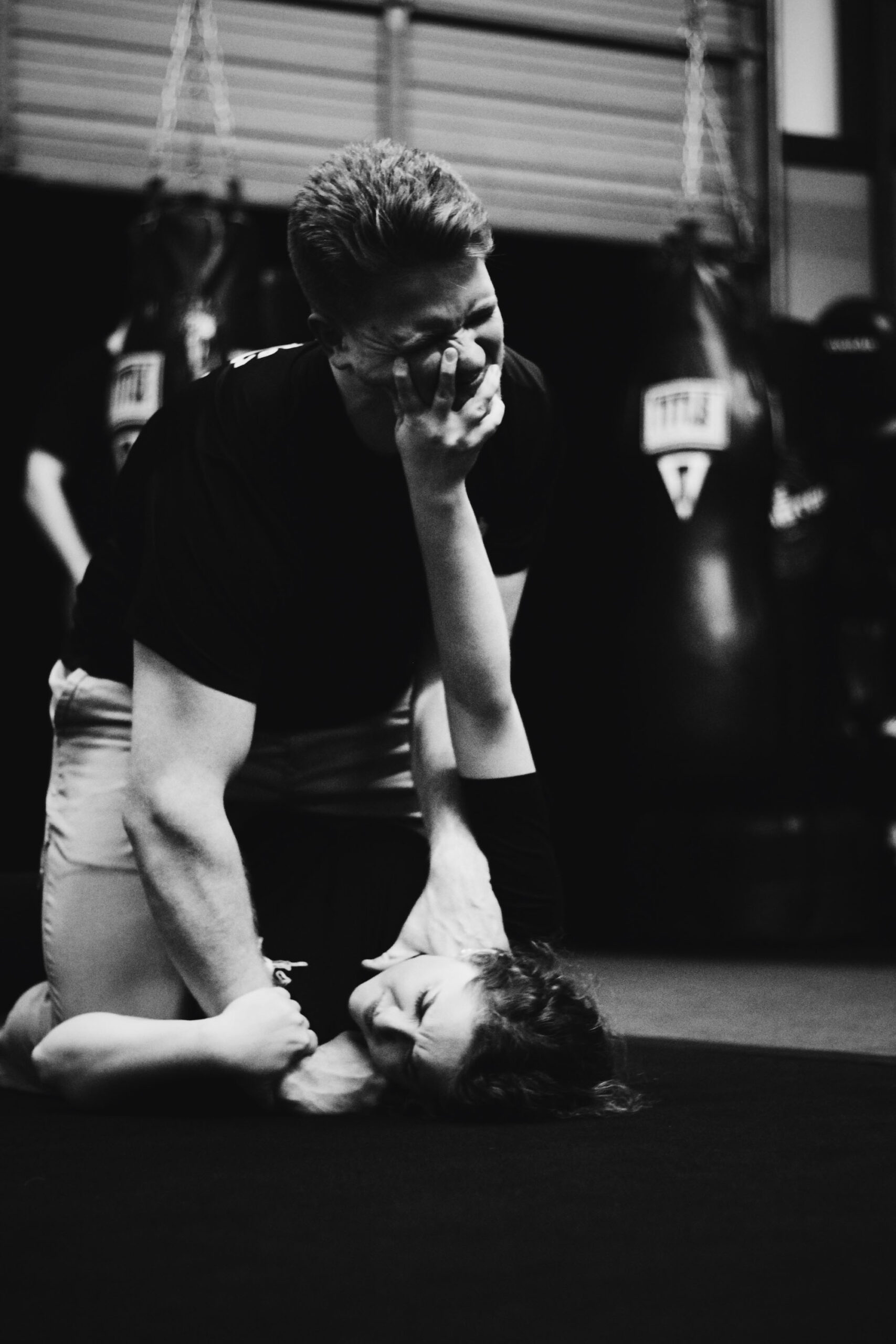 Two people practicing martial arts training.